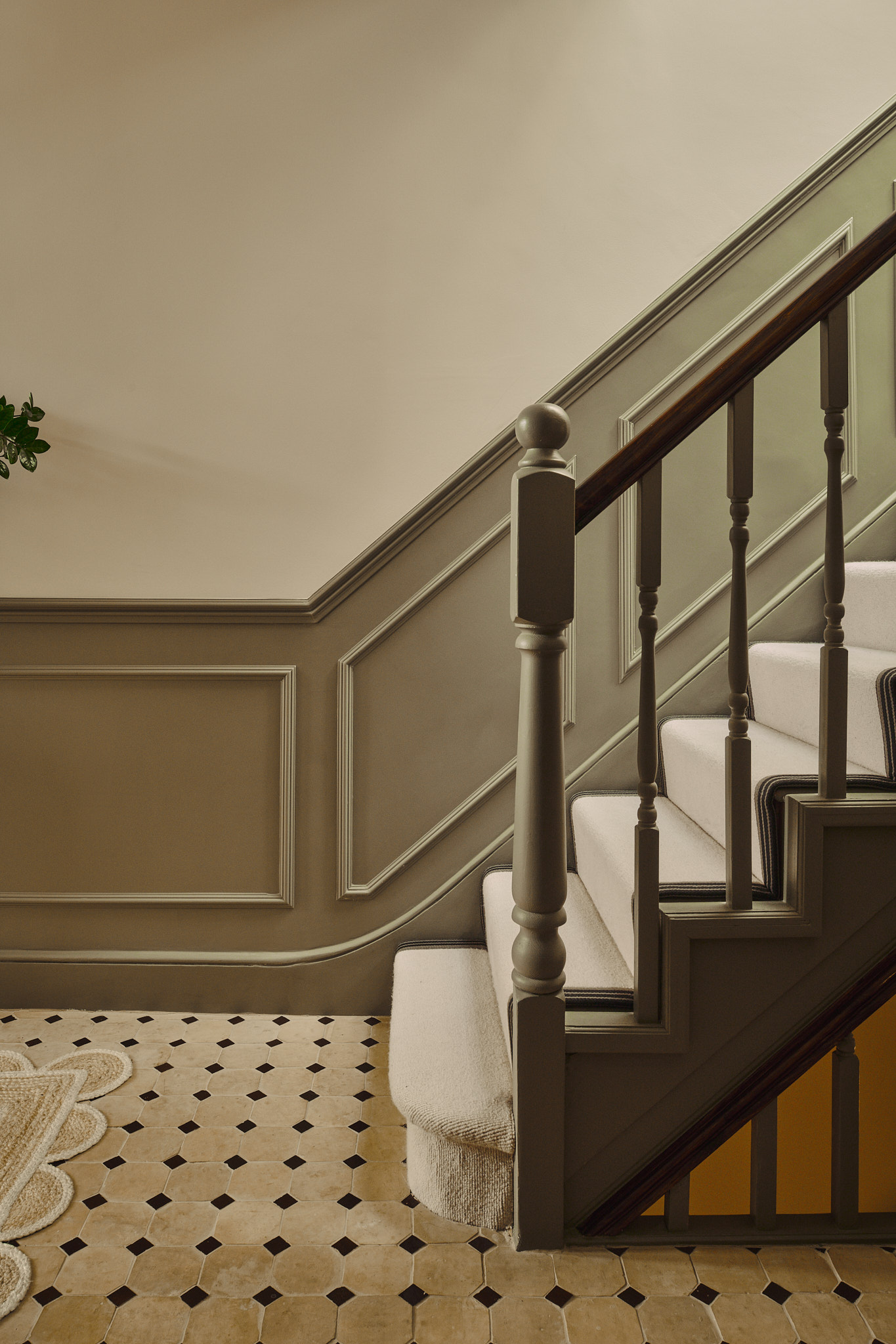 The staircase and panelled hallway