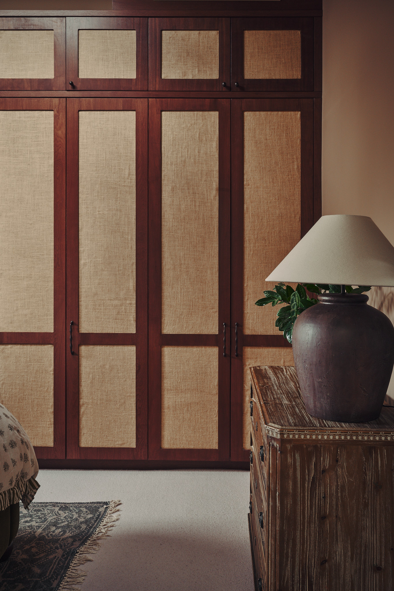 Fitted bedroom wardrobes with cane panels