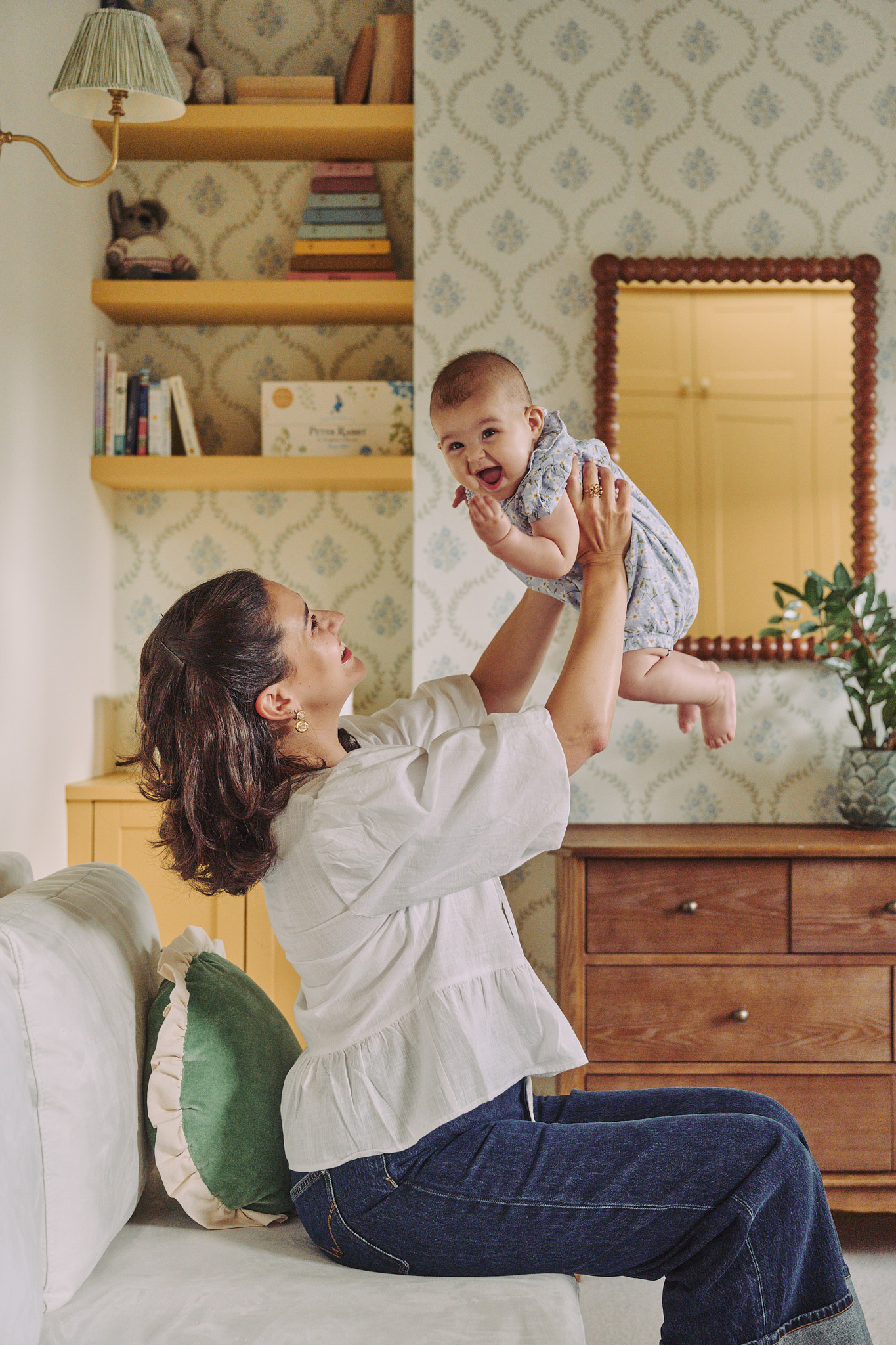 The nursery, with patterned wallpaper